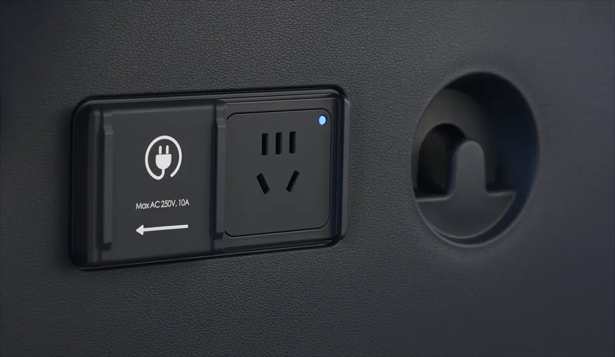 Tomacorriente de 220V dentro del Hyundai ELEXIO.